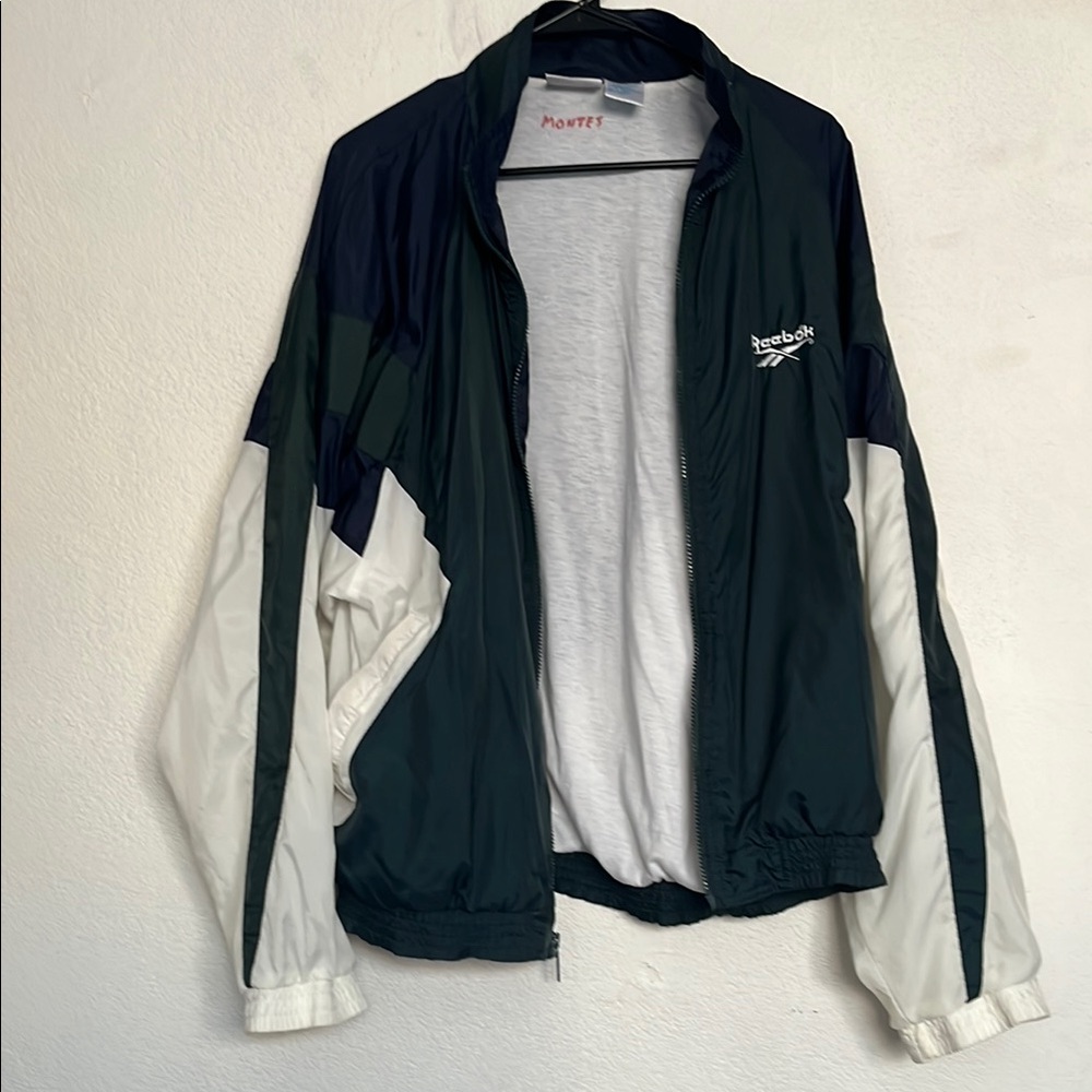 Reebok Green and White Windbreaker Jacket vintage 90’s the jacket has a named